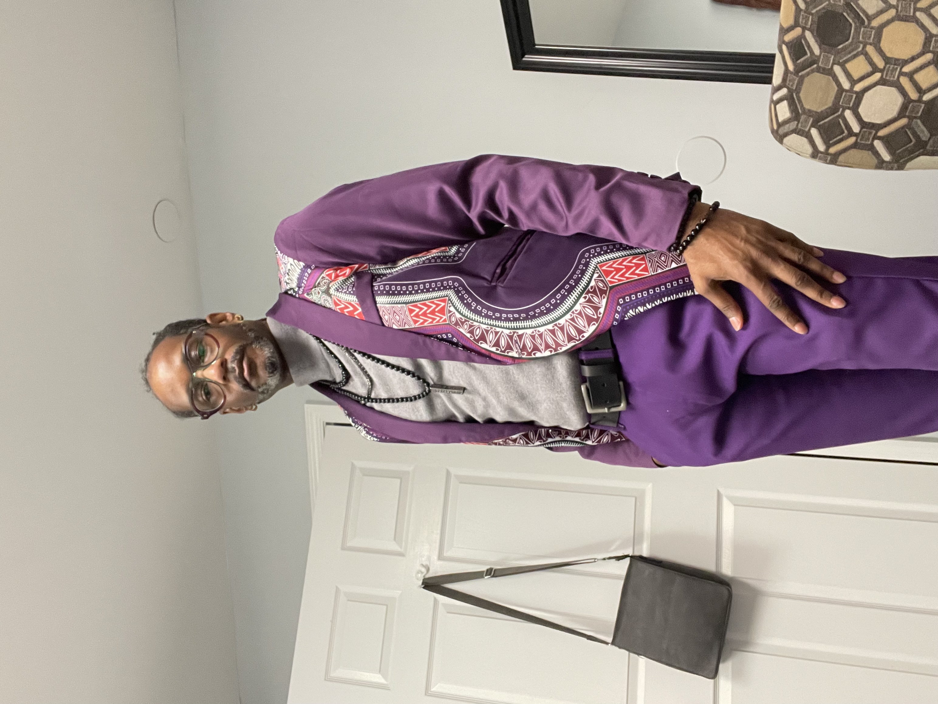 Dr. Nick in a purple suit
