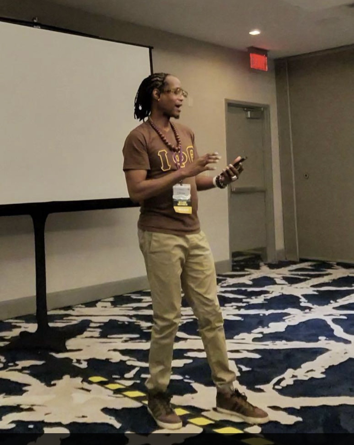 Dr. Nick presenting at an Iota Phi Theta event